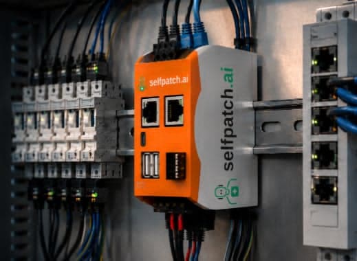 selfpatch Diagnostics Box mounted on a DIN rail in an electrical cabinet